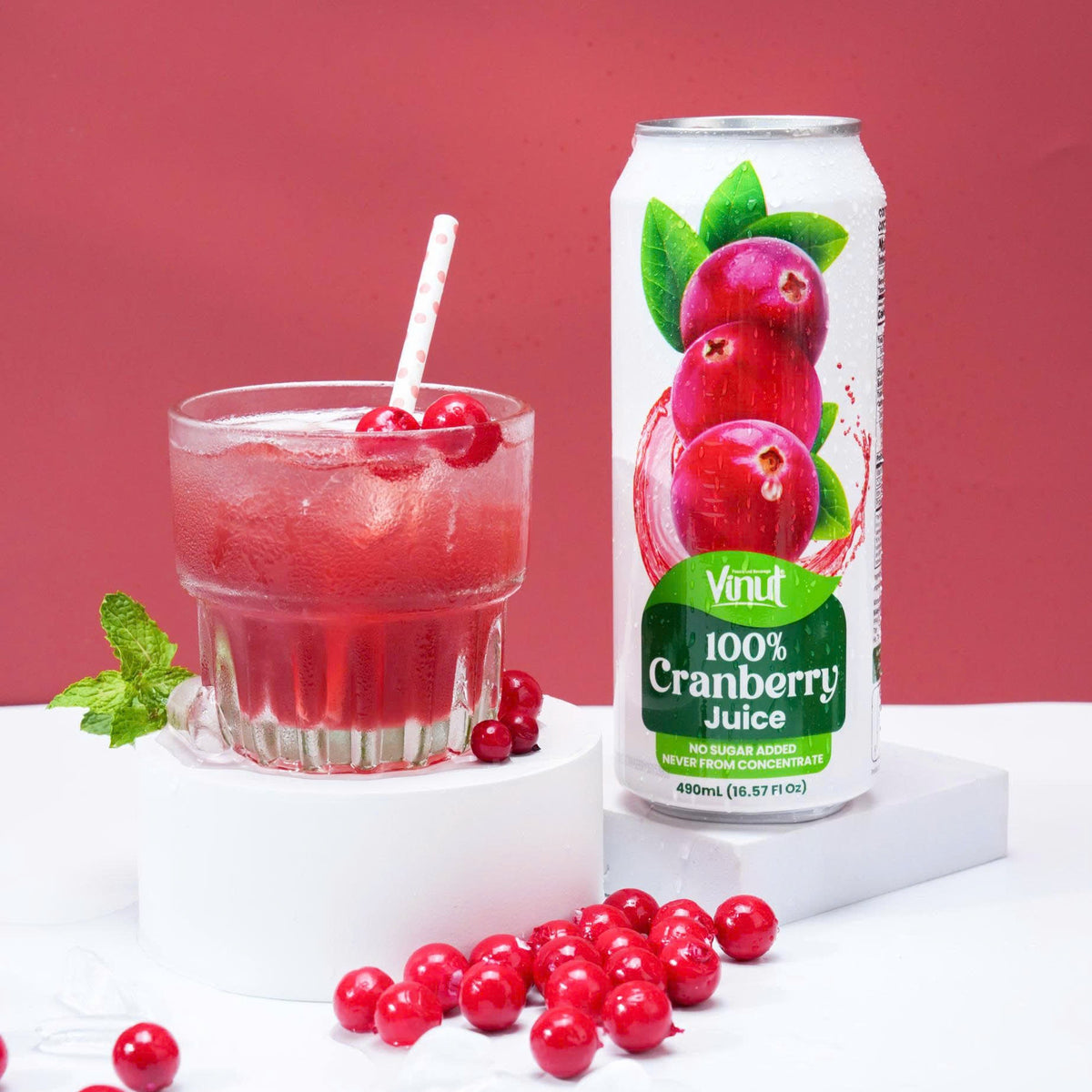 VINUT 100% cranberry juice no pulp 500 mL can displayed with fresh fruit ingredients