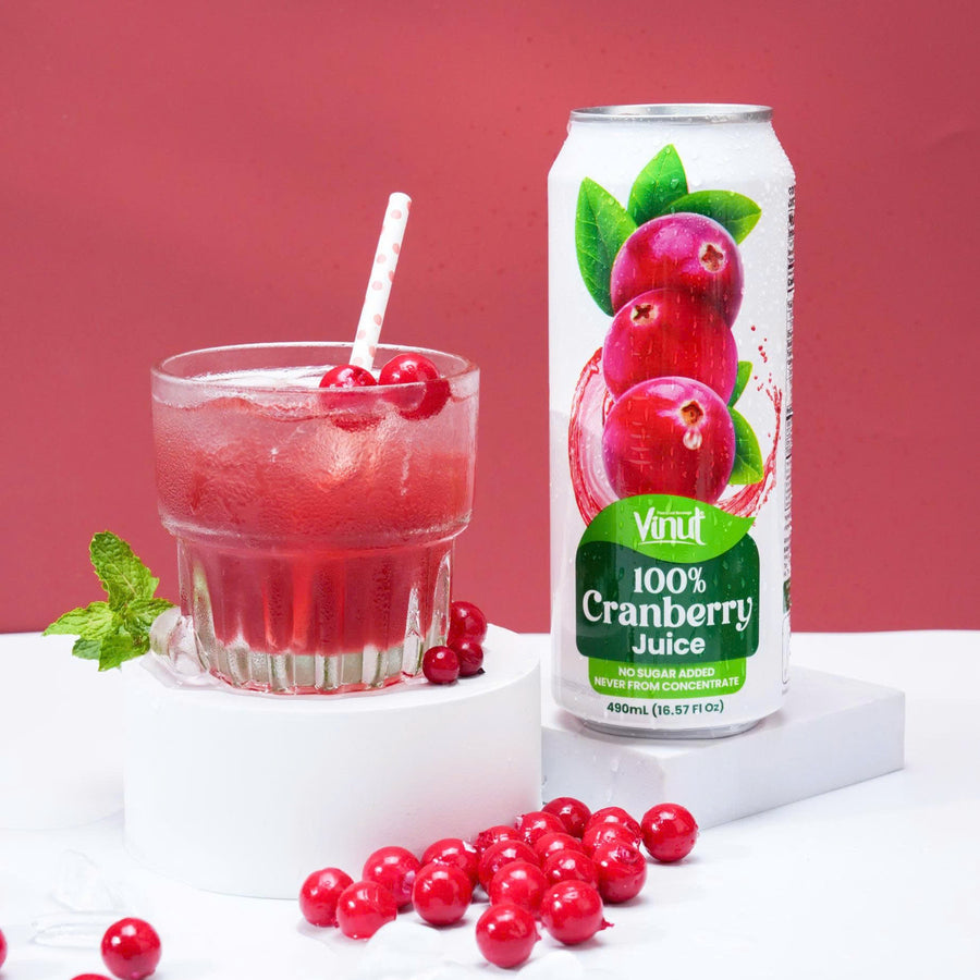 VINUT 100% cranberry juice no pulp 500 mL can displayed with fresh fruit ingredients