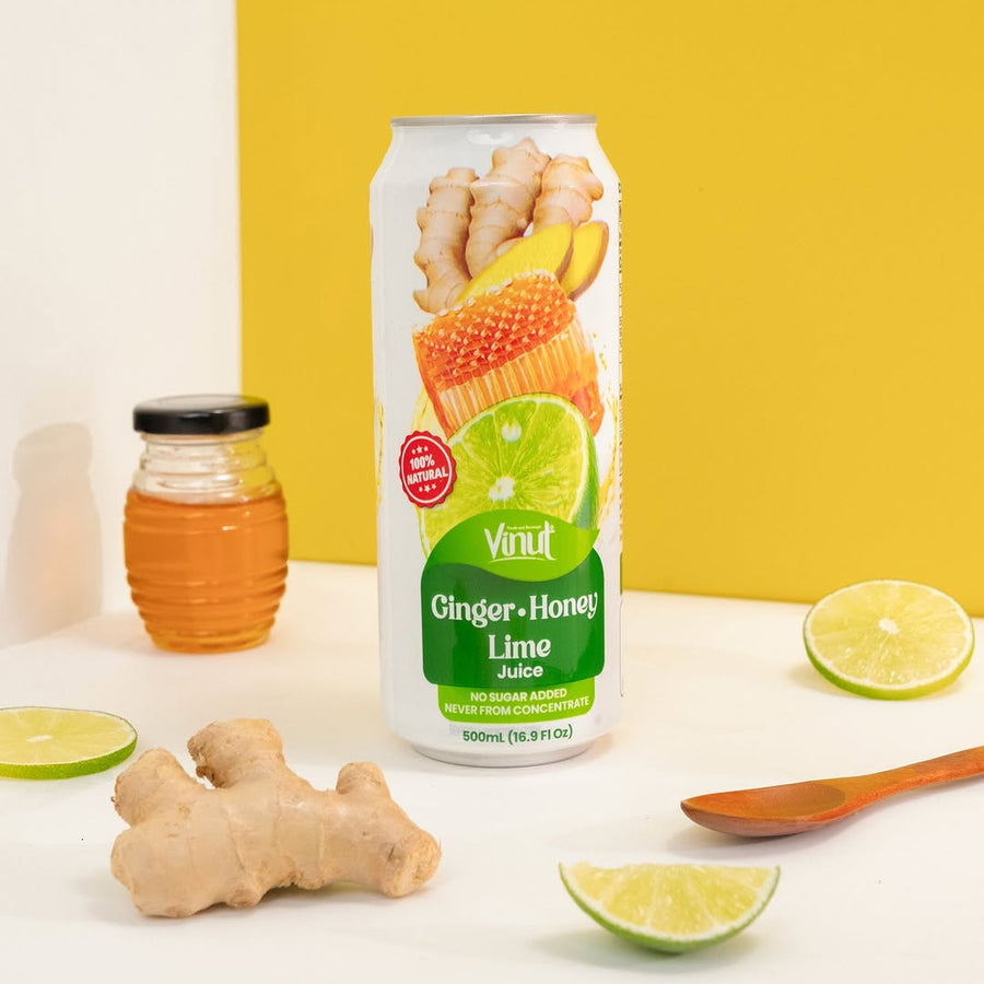 VINUT Ginger Honey Lime juice 16.9 oz can displayed with fresh ginger, honey and lime